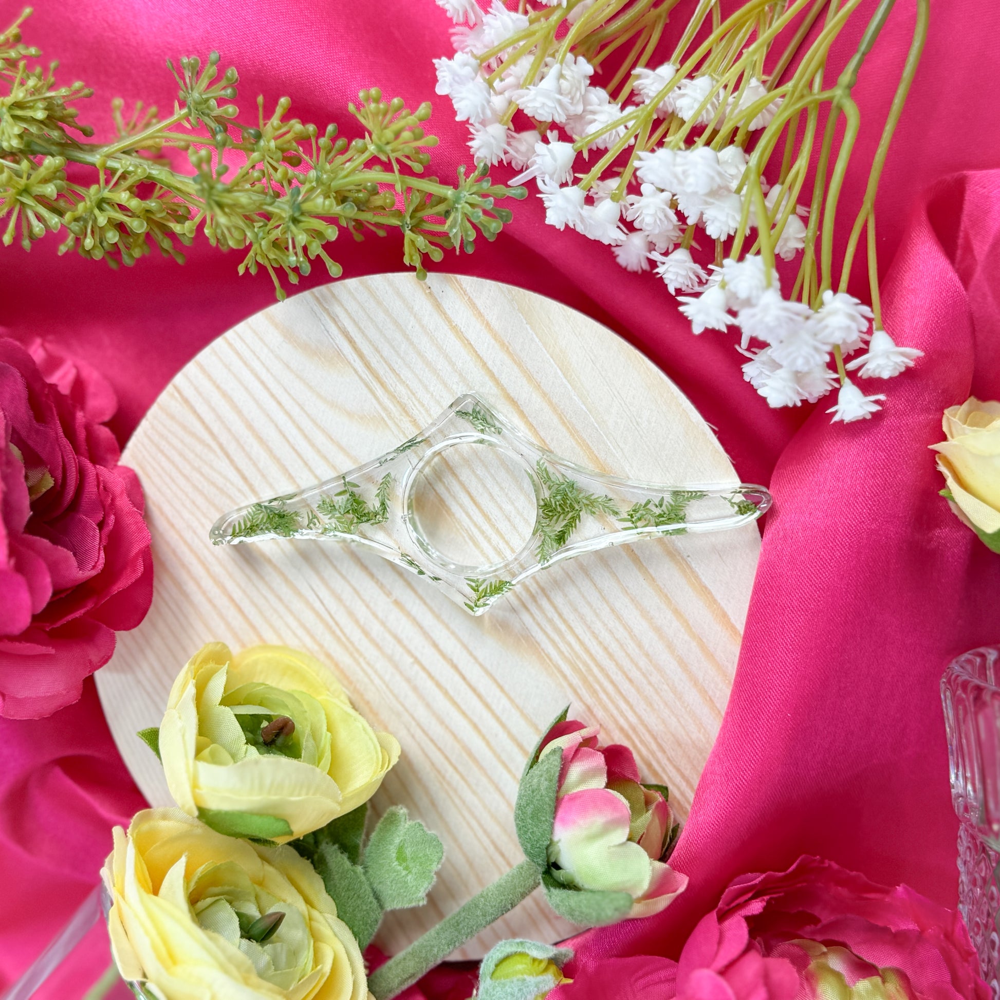 Resin page holder featuring real preserved flowers, handmade in Utah.